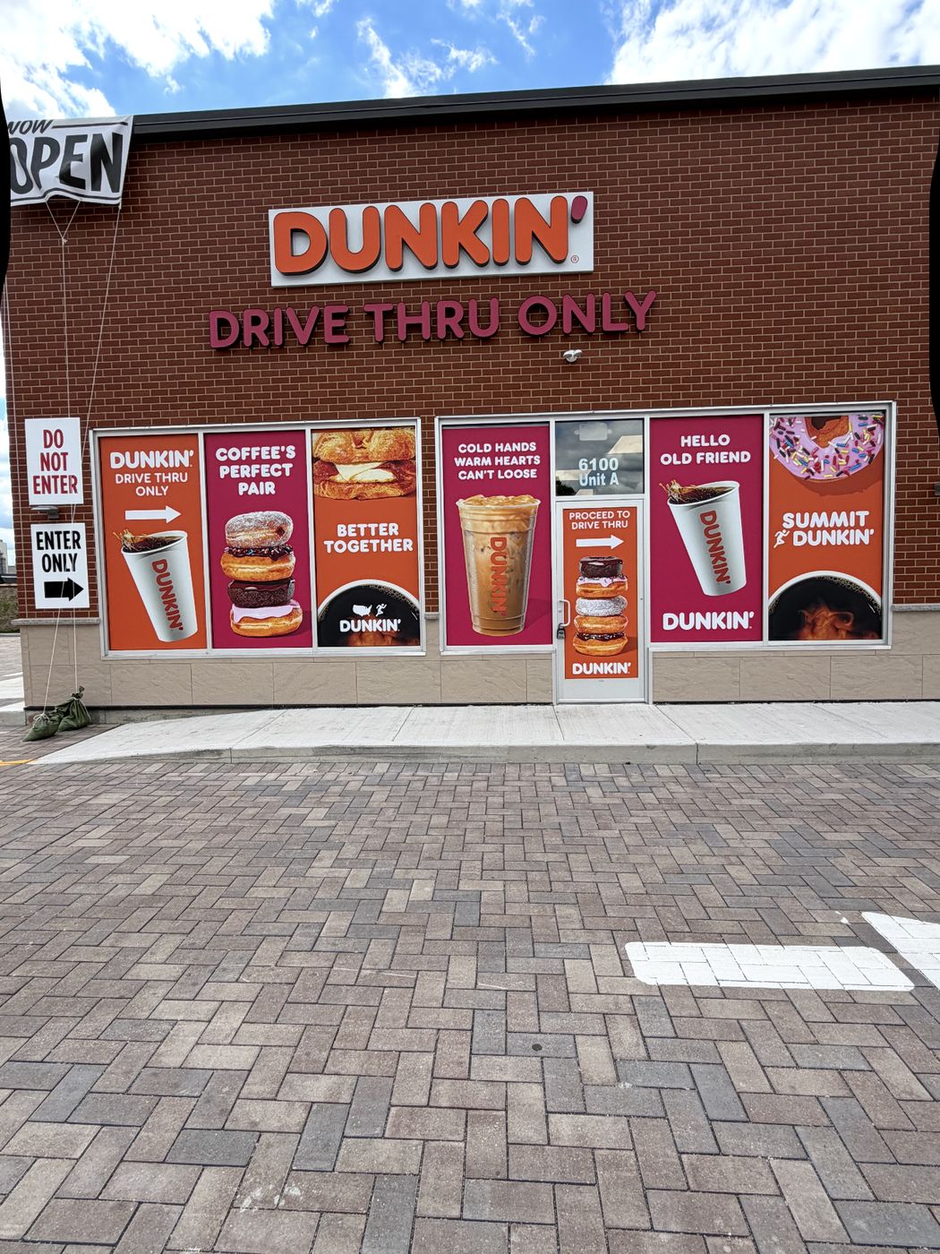 Dunkin' drive-thru with printed window graphics