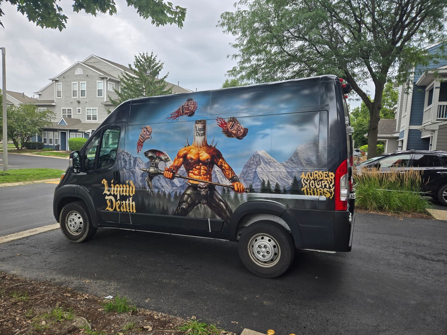 Liquid Death cargo van, full print wrap, side view