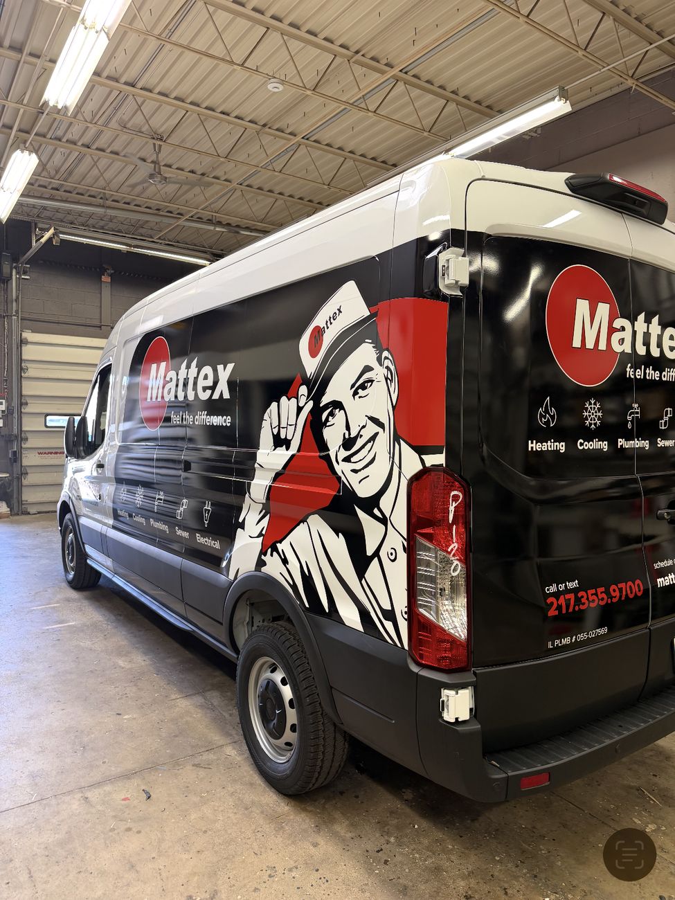 Mattex service van with printed fleet branding, rear three-quarter view